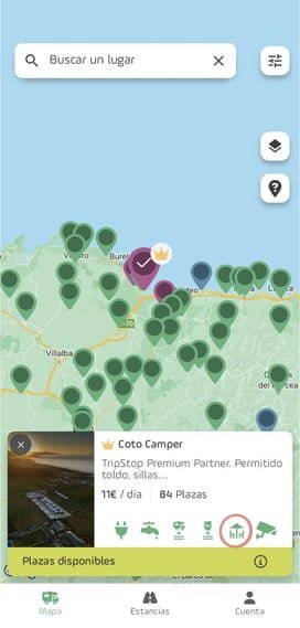 Captura de TripStop donde se puede ver la ficha del área de Coto Camper y se ve resaltado el icono de permitido toldo, sillas,...