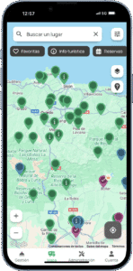 Captura de pantalla de una aplicación móvil que muestra un mapa interactivo con ubicaciones marcadas para áreas de autocaravanas, puntos turísticos e información útil en la región norte de España.